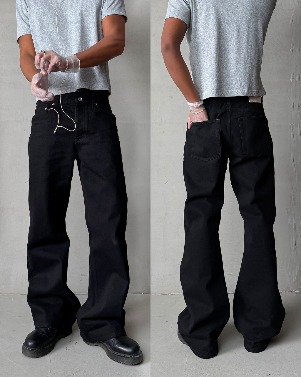 Men's black bootcut denim jeans, flared leg detail