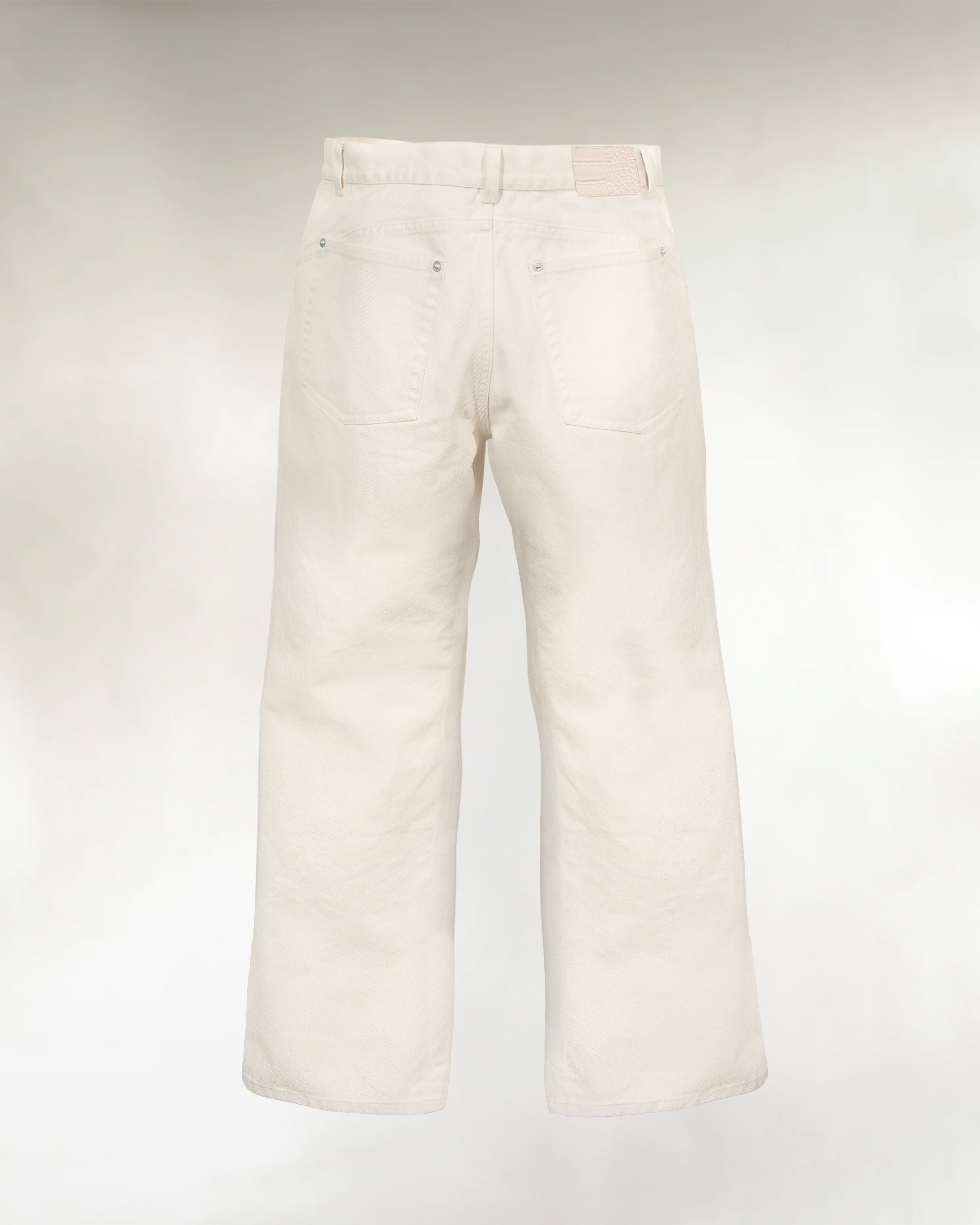 Men's ivory bootcut denim jeans with leather patch detail
