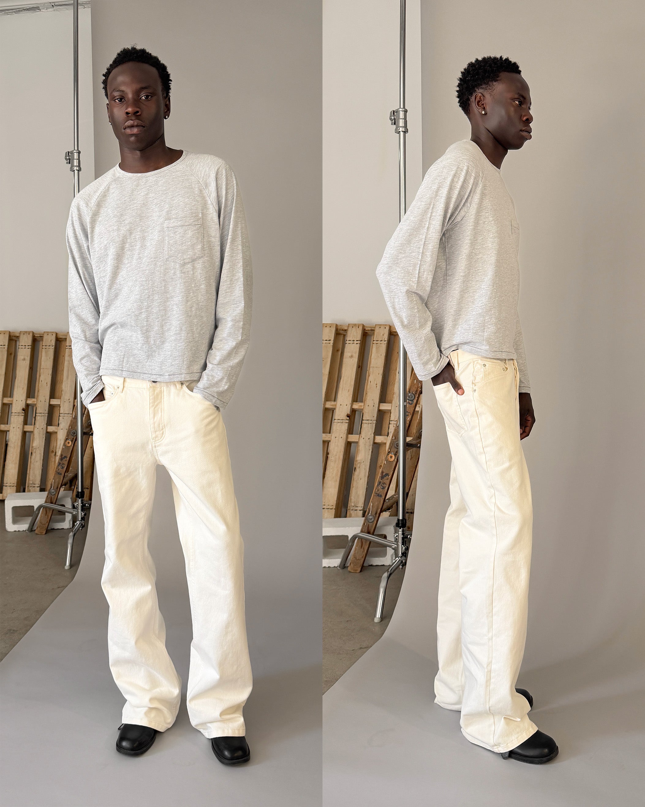 Men's ivory bootcut denim jeans, standing view