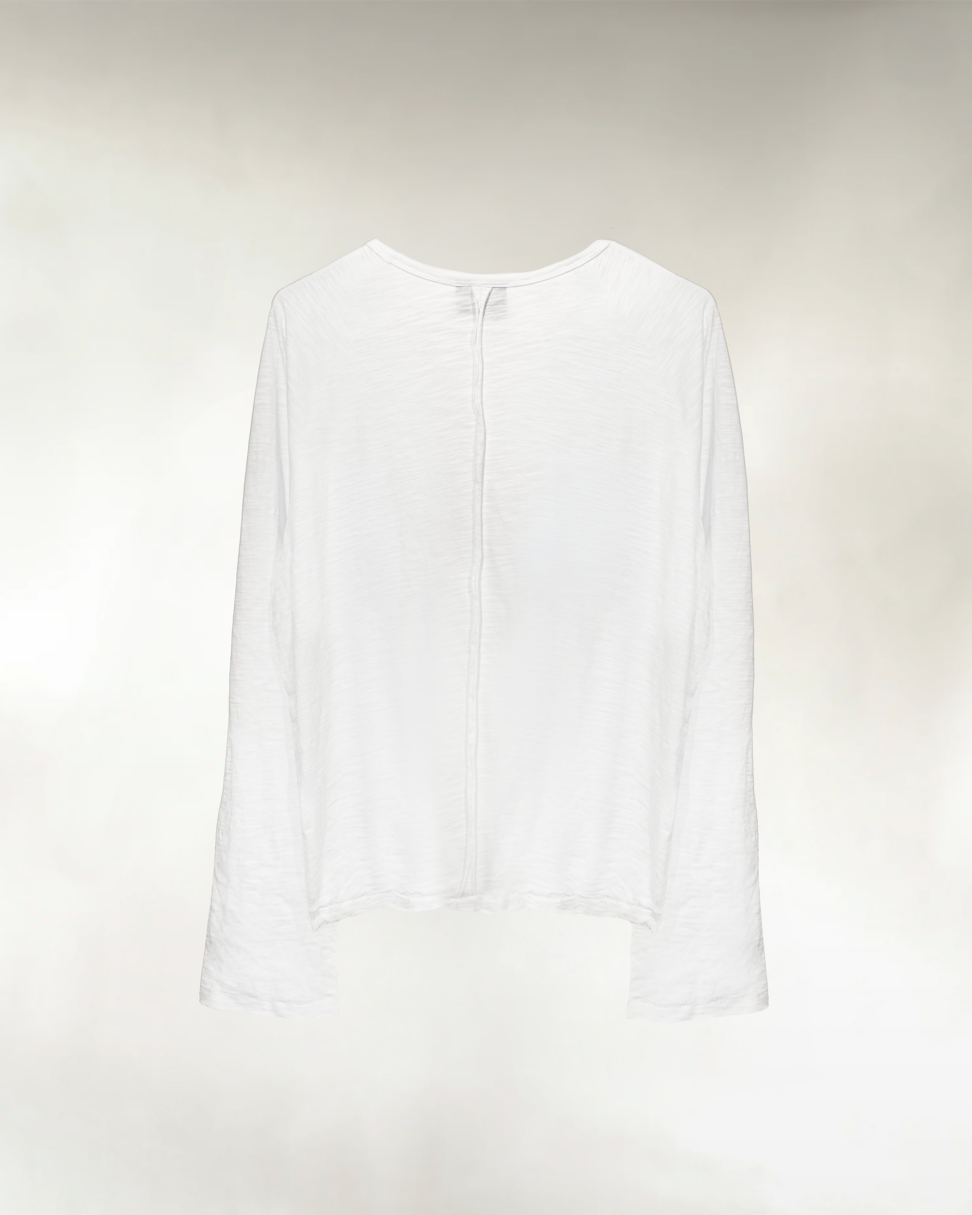 Men's white slub cotton raglan shirt, back view with raw seam