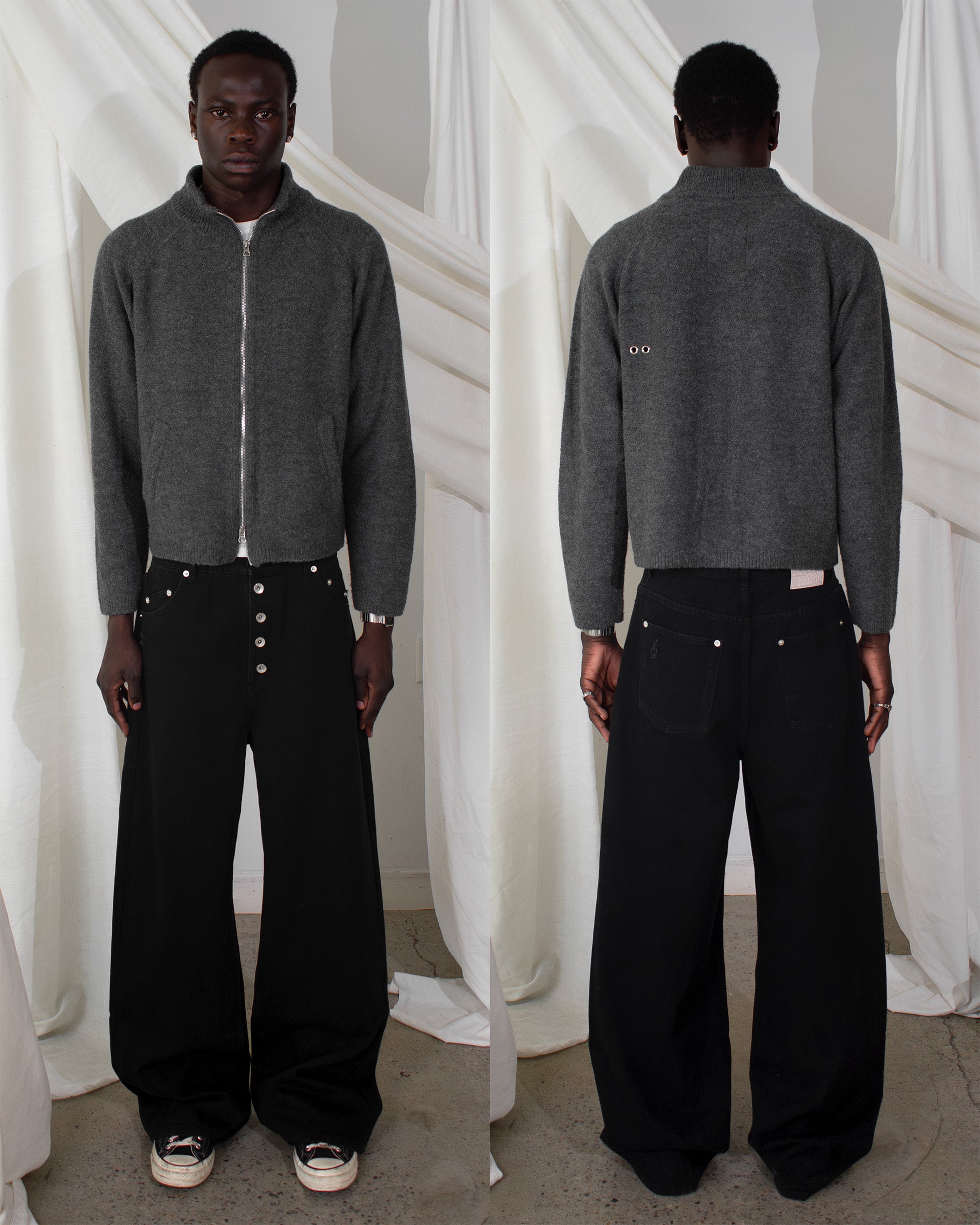 Men's grey wool blend zip-up knit sweater worn on body